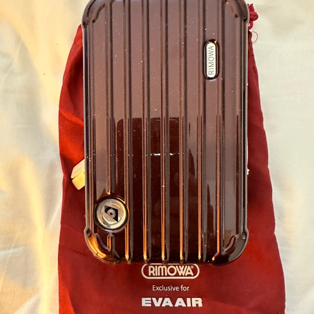 EVA AIR’s RIMOWA Toiletry Case in Red Burgundy color 7”x4.25x2.50”